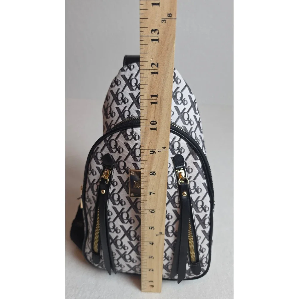 XOXO Monogram Sling Backpack Black White Gold Tone Logo Adjustable Strap NWT